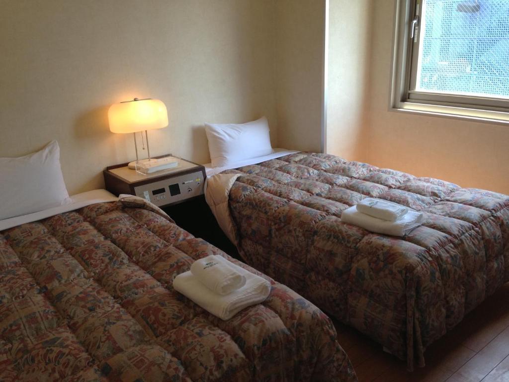 Osaka City Hotel Kyobashi Szoba fotó