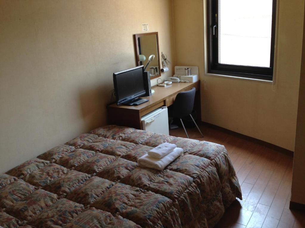 Osaka City Hotel Kyobashi Szoba fotó